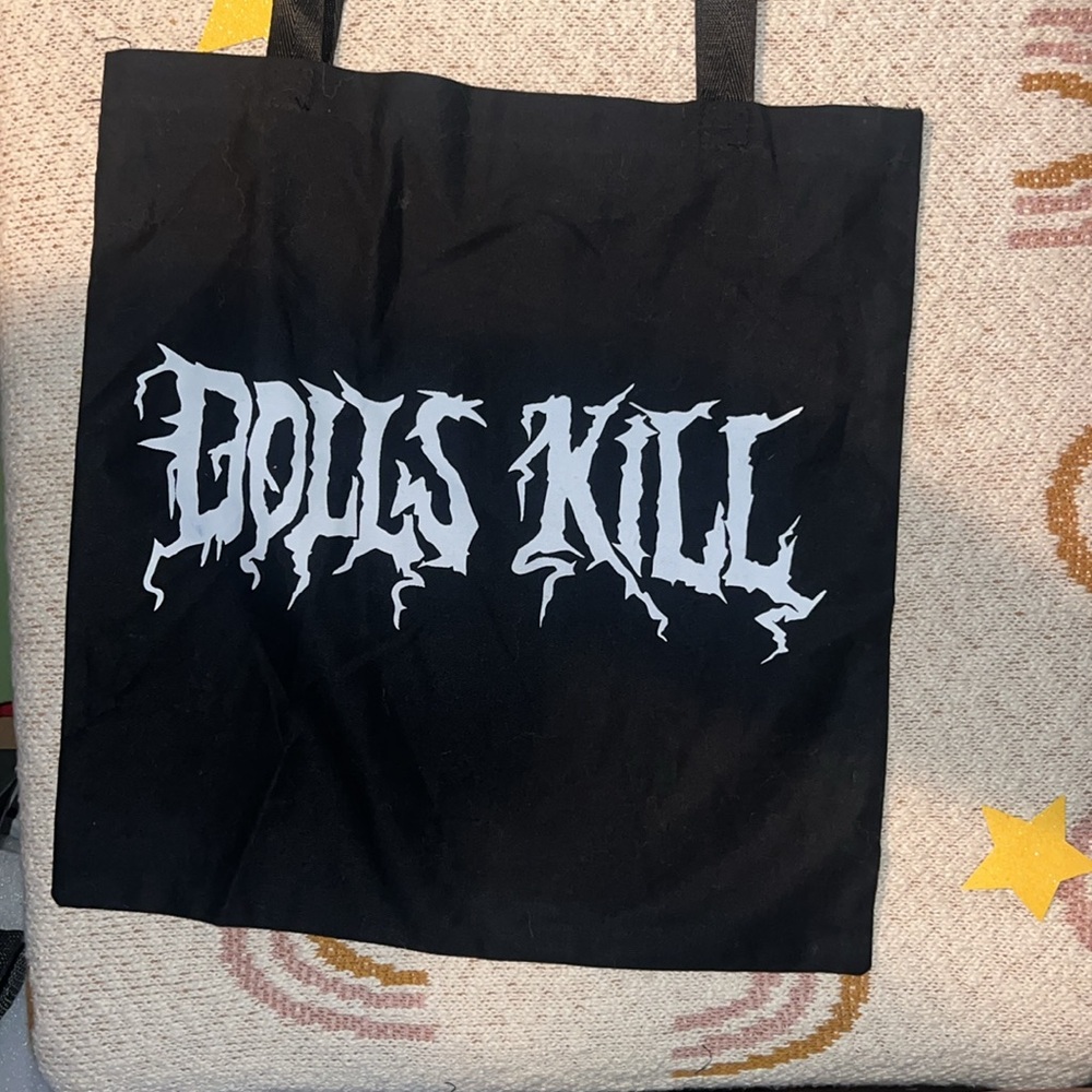Black/white print dolls kill reusable canvas tote bag